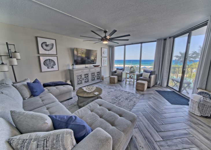 Living area has a new sleeper sofa, new smart tv and the most amazing views ever as well as beautiful modern coastal decor
