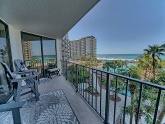 Spacious balcony with new polywood seating to enjoy the amazing views of the lagoon pool and Gulf of Mexico