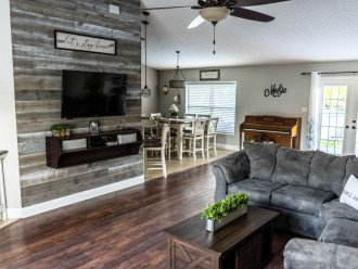 Living Room with view to backyard and Dining Room