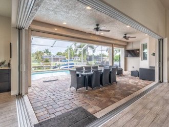 Sliding doors fully open to the lanai making the space feel huge!