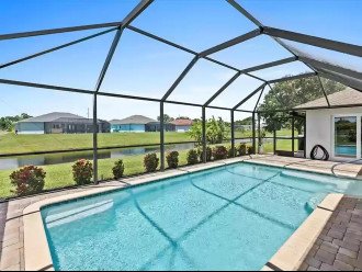 The Onyx Pearl Private Home~Heated Pool~Sleeps 6~Canal View #1