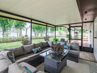 Screened in patio with seating