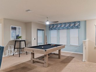 The loft boasts a pool table, board games, a large screen TV and plenty of room to stretch out.