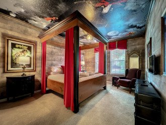 Fall asleep watching a quidditch match in this spectacular Harry Potter room with a king sized bed.