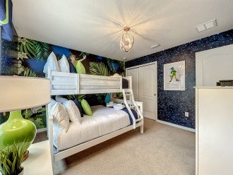 Bedroom #6 features a twin over queen bunk and whimsical Peter Pan decor.