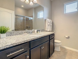 This first floor entry bathroom is a full bathr with a walk-in shower.