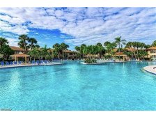 NAPLES is the place to be! Spacious, coastal vibe condo with resort style pool.