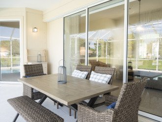 3 large sliding doors that lead out to the Lanai from Master, Family room...