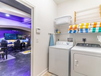 Laundry Room with Iron and Ironing Board