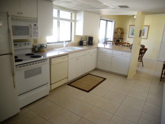 Kitchen is large and well equiped with microwave, dishwasher, fridge with ice maker, toaster, coffee maker, kettle, blender, mixer, lots of pots and no stick fry pans, bakeware and lots of wine glasses!