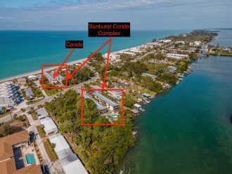 Complex is made up of 2 elongated buildings on beach side and 2 on the bay. This unit is on the bay side steps from the pool and dock, but you have access to the best of both worlds and everything is just a short walk.