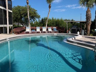 The bayside heated pool is only steps from the unit and overlooks both the dock and the bay. You can sit by the pool and still be connected with high speed internet access while enjoying the view.