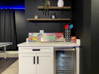 Games and more games! Store some cold beverages to enjoy in the Game Room