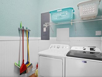 Washer/dryer plus complimentary laundry detergent and beach towels.