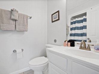 En suite bathroom off Bunk room with shower/tub combo