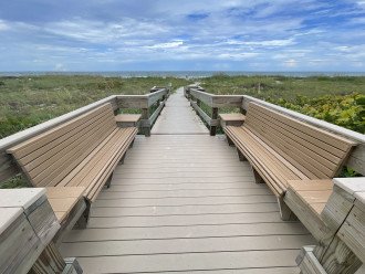 Beach walkway with viewing area for launches