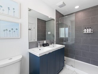 The Palm Room Ensuite has double sinks and a rain shower head