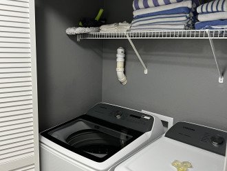 Samsung Full Washer/Dryer (Brand New)- Beach towels and cleaning supplies