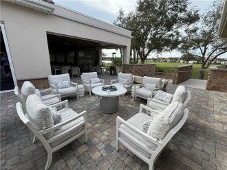 The fire pit adjacent to the Oasis is perfect for relaxing w/friends
