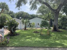 Ultra clean, light and airy coastal home with garage ~ 5 block walk to beach