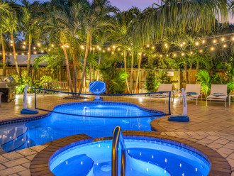 The backyard comes to life at night! Perfect for spending time in the pool, playing yard games, grilling out, or watching the big game!