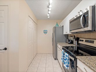 Fully Stocked Kitchen makes meal prep a breeze inside the condo.