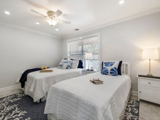 Bedroom 2 offers a queen & Twin bed, TV & Private Bath