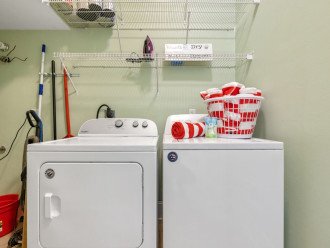Laundry Room w/ washer n dryer, iron & ironing board. We also offer beach towels to use, during your stay.
