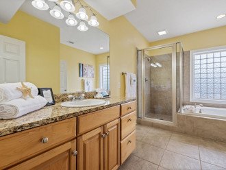 Master Bath offers a shower, garden tub & water closet. * the spa jets have been disconnected, this operates as a garden tub only*