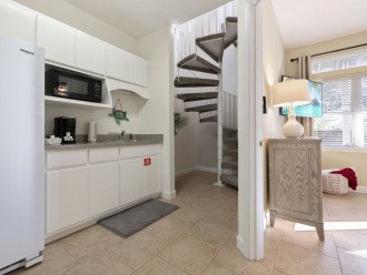 Kitchenette on the lower level - off the master bedroom. The spiral stairs lead to the main level of the house.