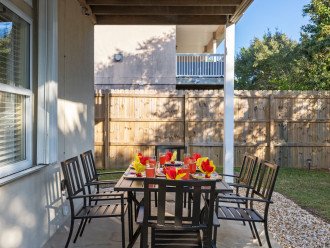 Back yard Patio off the master bedroom - offers a grill and plenty of space for everyone to enjoy a meal.