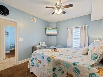 Master Bedroom Suite offers a king bed, tv & private bath.