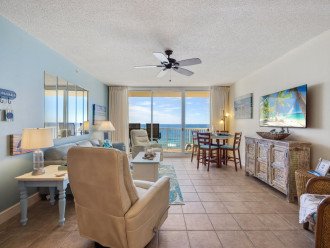 This condo offers an open living room/ dining area & kitchen -