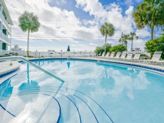 This idyllic pool situated directly across the street from the Gulf of Mexico. The location offers panoramic sunset views, while the warm breezes from the nearby ocean add to the natural beauty and serenity of this wonderful place