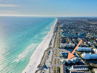 Talk about a prime location! You're steps away from soaking your toes in emerald waters and sugary white Miramar beach, directly across the street.