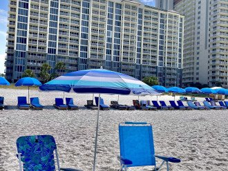 Beach chairs and umbrella are provided in the unit.