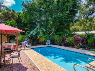 Enjoy the lush gardens at your private pool.