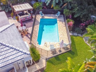Birdseye view of this gorgeous backyard with the safety fence up.