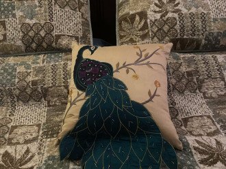 Peacocks are the theme in the master suite!