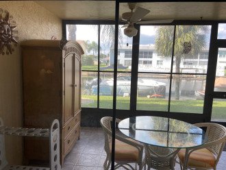 Huge Lanai overlooking the water with door to walk dog or go to pool!