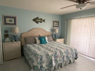 Kingsize master bedroom with full lanai overlooking the water