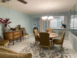 Tile floors and area rugs throughout