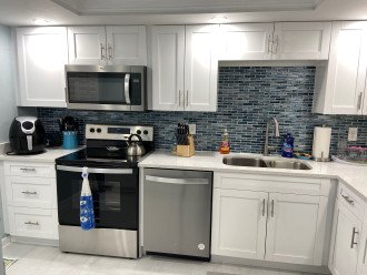 New Kitchen with Quartz Countertops and fully equipped even a crock pot