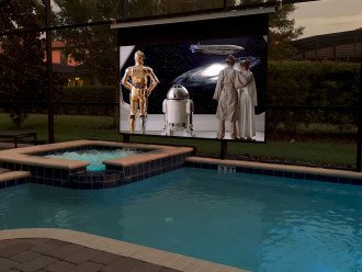 Poolside Theater-125" Screen-4K Projector-Surround Sound