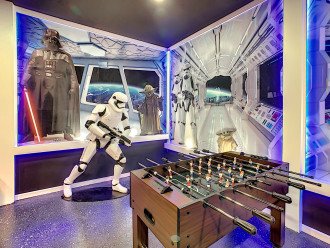 Have Loads Of Fun In The Star Wars Theme Game Room "Guarded" By A Life Size Storm Trooper