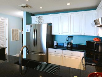 Stainless steel appliances and quartz countertops!