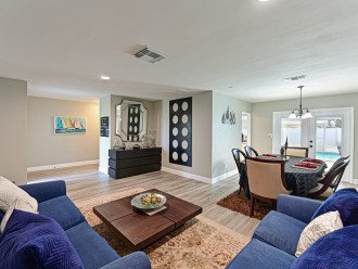 Spacious, Naturally-Lit Living Room with Comfy Accent Sofas & Beautiful Coffee Table
