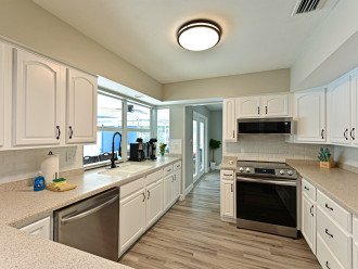 Updated, Fully-Equipped Kitchen Featuring Stainless-Steel Appliances