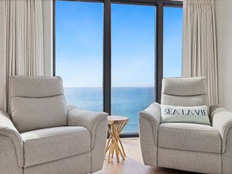 You’ll love gazing at the view from these comfy recliners in the Primary Bedroom.
