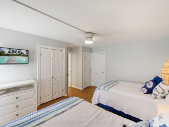 Storage in 2nd Bedroom is in the form of a closet, dresser, 2 nightstands with drawers, and a luggage rack. Lull yourself to sleep watching the 32" TCL ROKU TV.